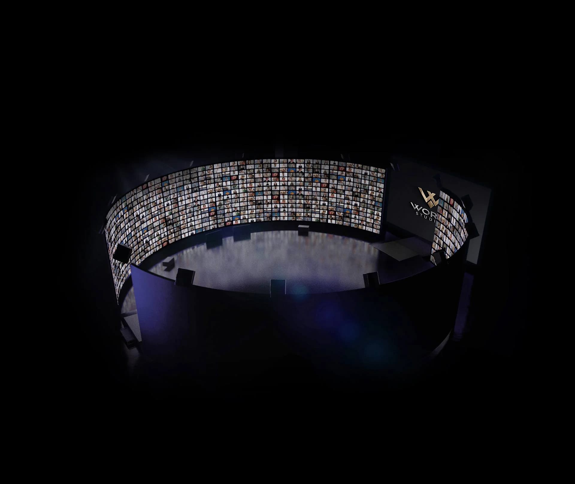 A rendering of the Worre Studios 360° LED volume — a curved wall of hundreds of live remote attendees wrapping the darkened stage floor, the Worre Studios logo lit on the wall.