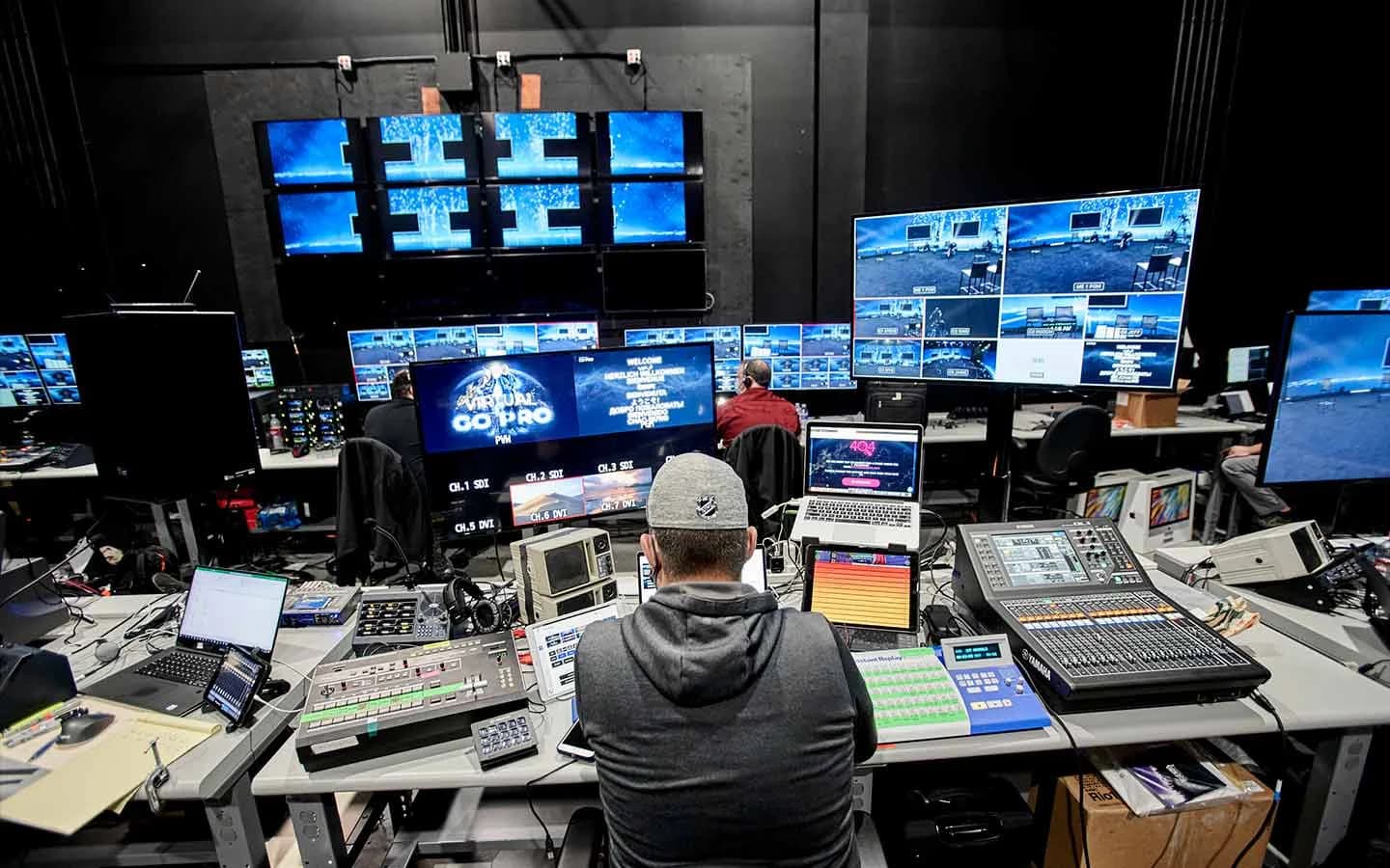 An engineer works at consoles in the Worre Studios broadcast control room.